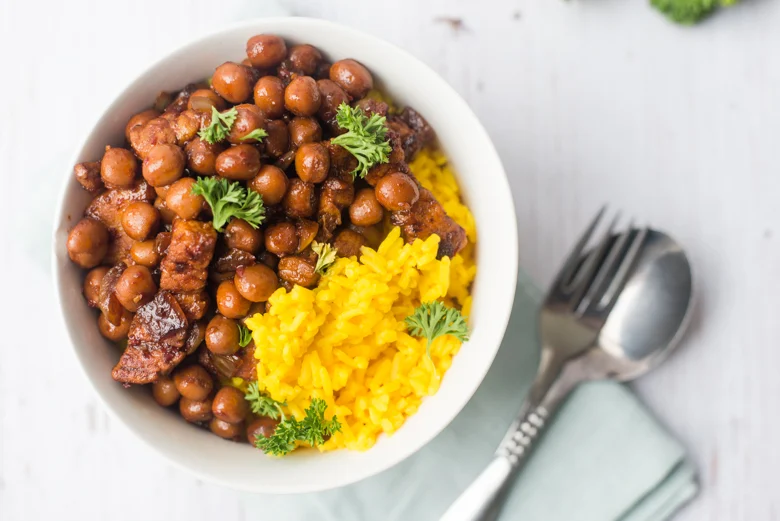 Pittige kapucijners met speklapjes uit de wok