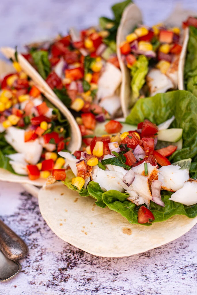 Soft taco's met Cajun kabeljauw en maissalsa 1 soft taco's met cajun kabeljauw en maissalsa