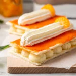 Oranjetompouce met sinaasappelglazuur