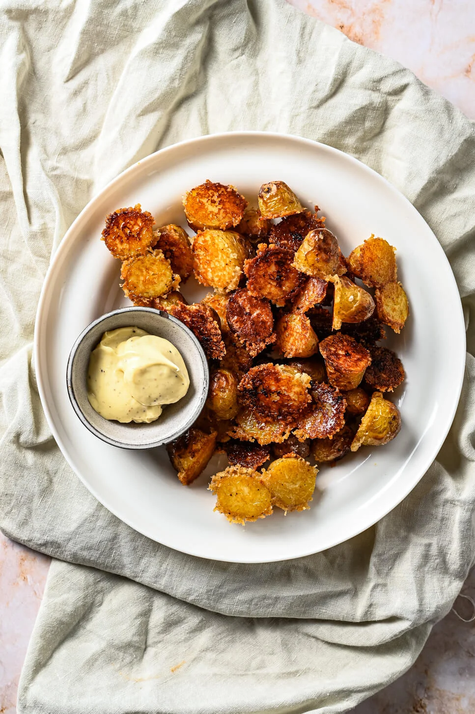 Aardappels uit de oven met Parmezaan 4 krokante aardappels